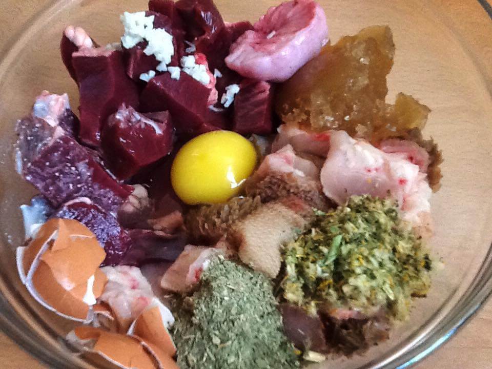 Fresh whole food ingredients prepared for naturally reared dogs